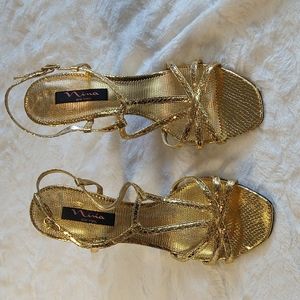 Nina New York Gold Straps Reptile scale design heeled shoes.